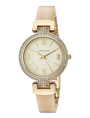 Anne Klein Women's Swarovski Crystal Accented Gold-Tone and Horn Resin Bangle Watch 